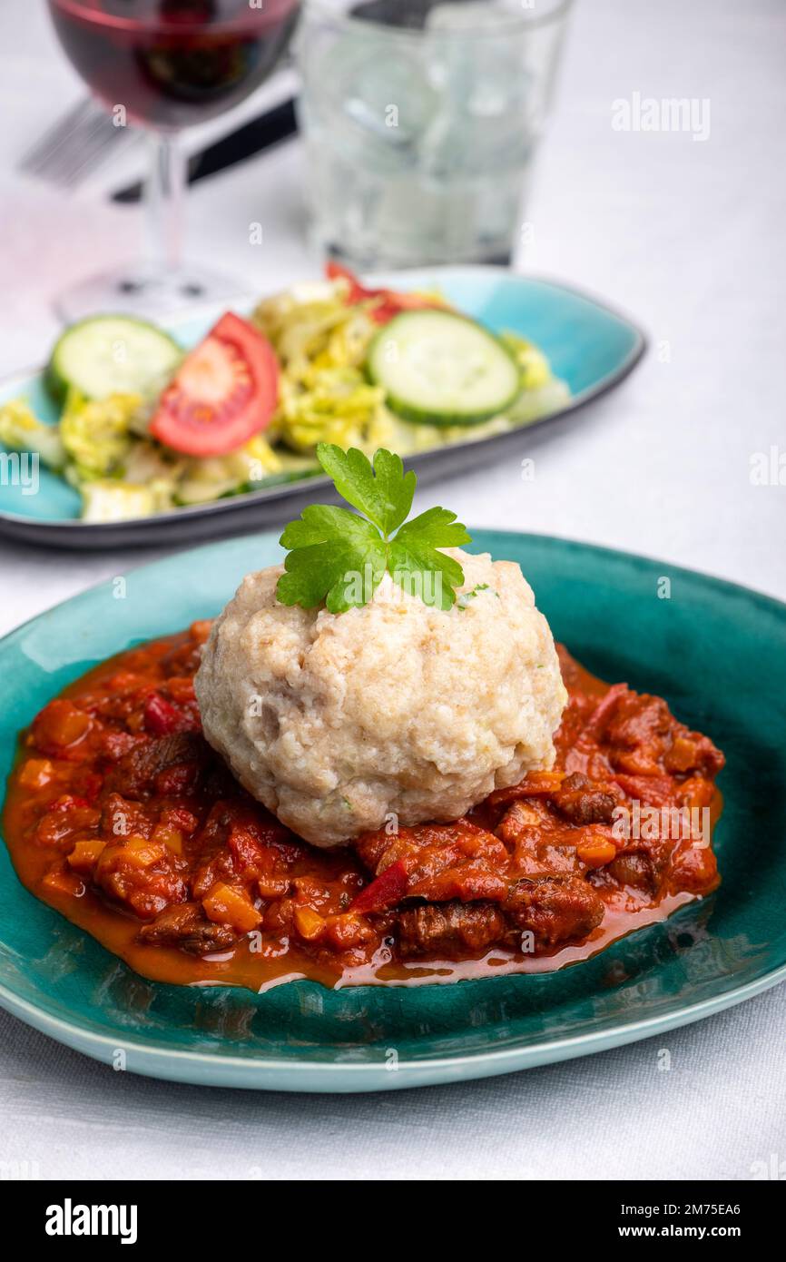 hungarian goulash with bread dumpling Stock Photo Alamy