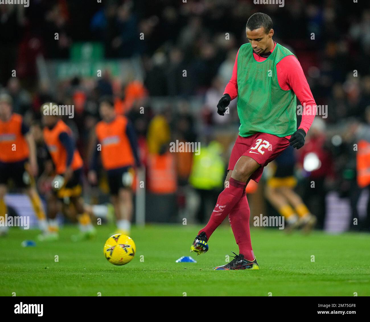 Joel Matip #32 of Liverpool warms up before the Emirates FA Cup Third Round match Liverpool vs Wolverhampton Wanderers at Anfield, Liverpool, United Kingdom, 7th January 2023  (Photo by Steve Flynn/News Images) Stock Photo