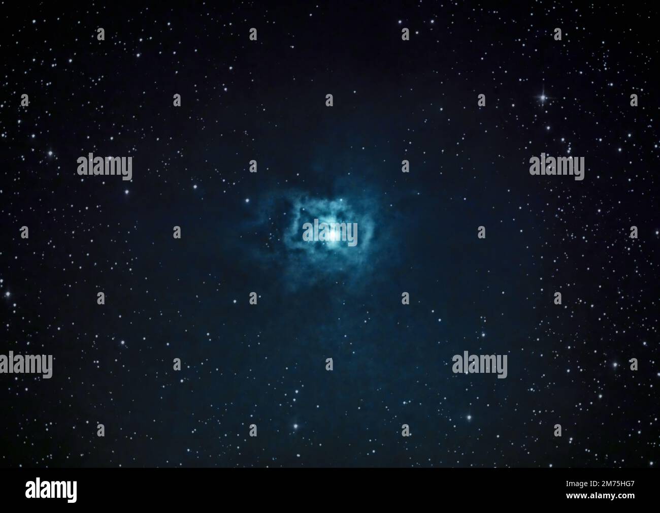 A gorgeous view of the Iris Nebula glowing blue with bright stars ...