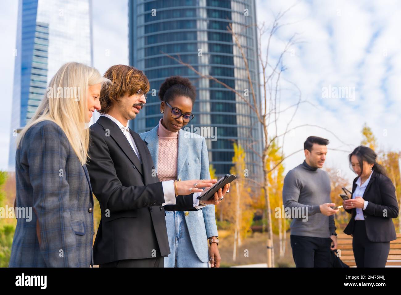 Multi-ethnic business people, business park, coworkers on their work break Stock Photo