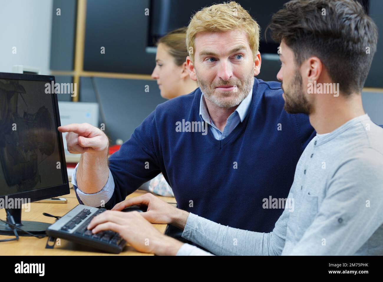 man training a new recruit Stock Photo