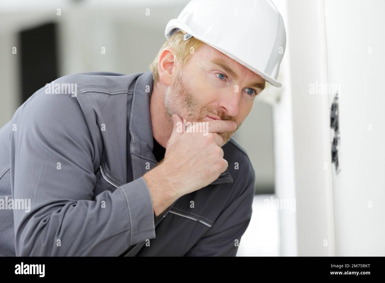 Businessman thinking something holding pencil hi-res stock photography ...