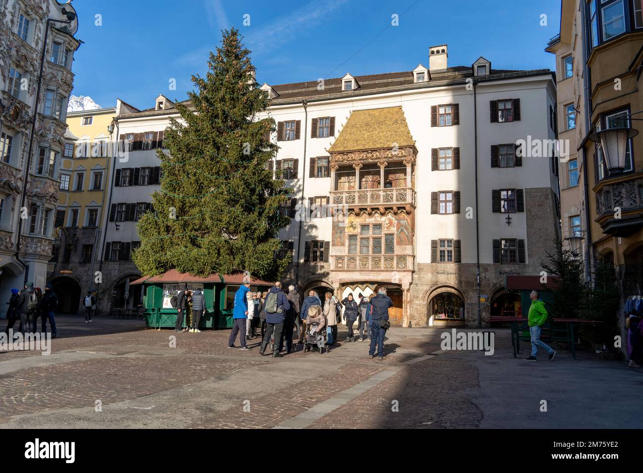 Innsbruck, Austria - December 2022: The Golden roof (Goldenes Dachl) is one of the most recognizable buildings in the city. The Bay window is covered Stock Photo