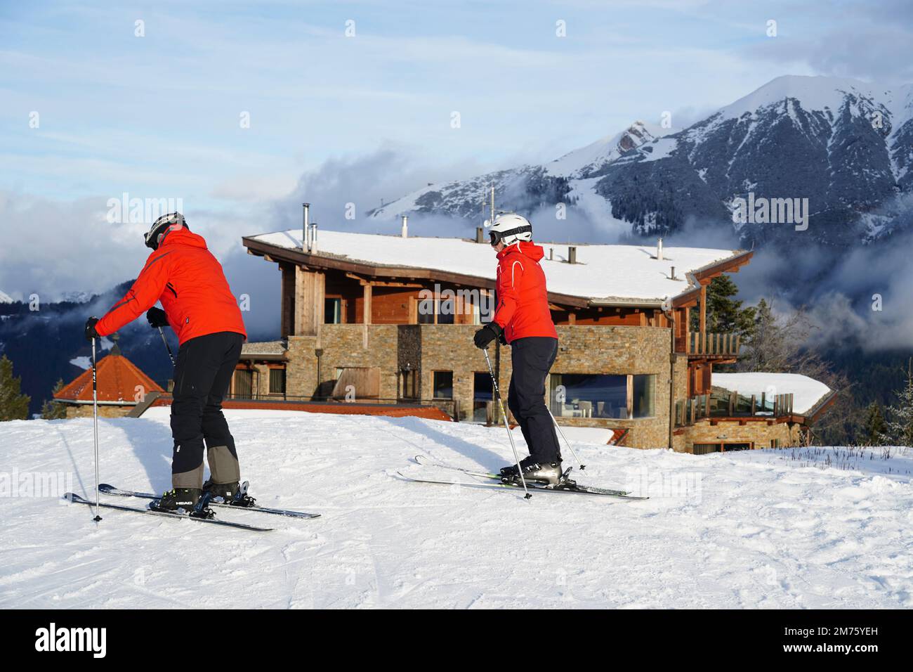 Seefeld, Austria - December 2022: Skiers at the top of the Gschwandtkopf ski slope in Seefeld Stock Photo