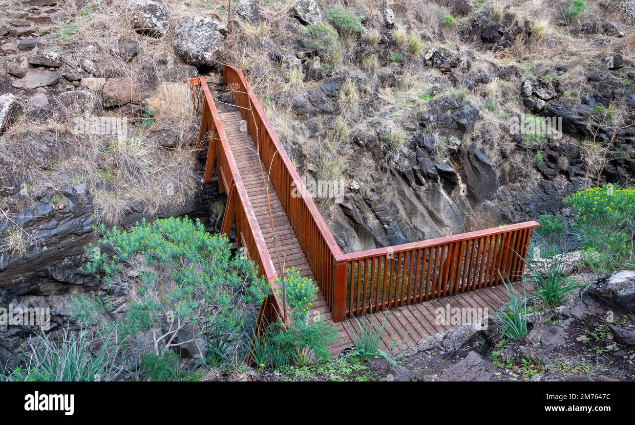 Bridge over the mountain stream Meshushim. Nahal Meshushim. Rocks in ...