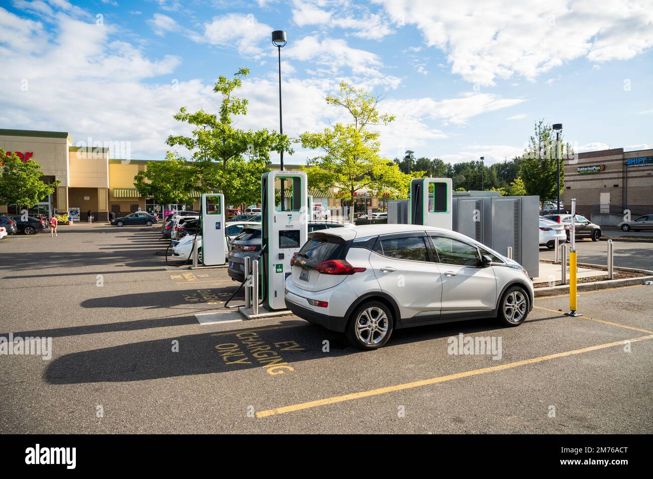 Electric car charging stations in front of a Fred Meyer store