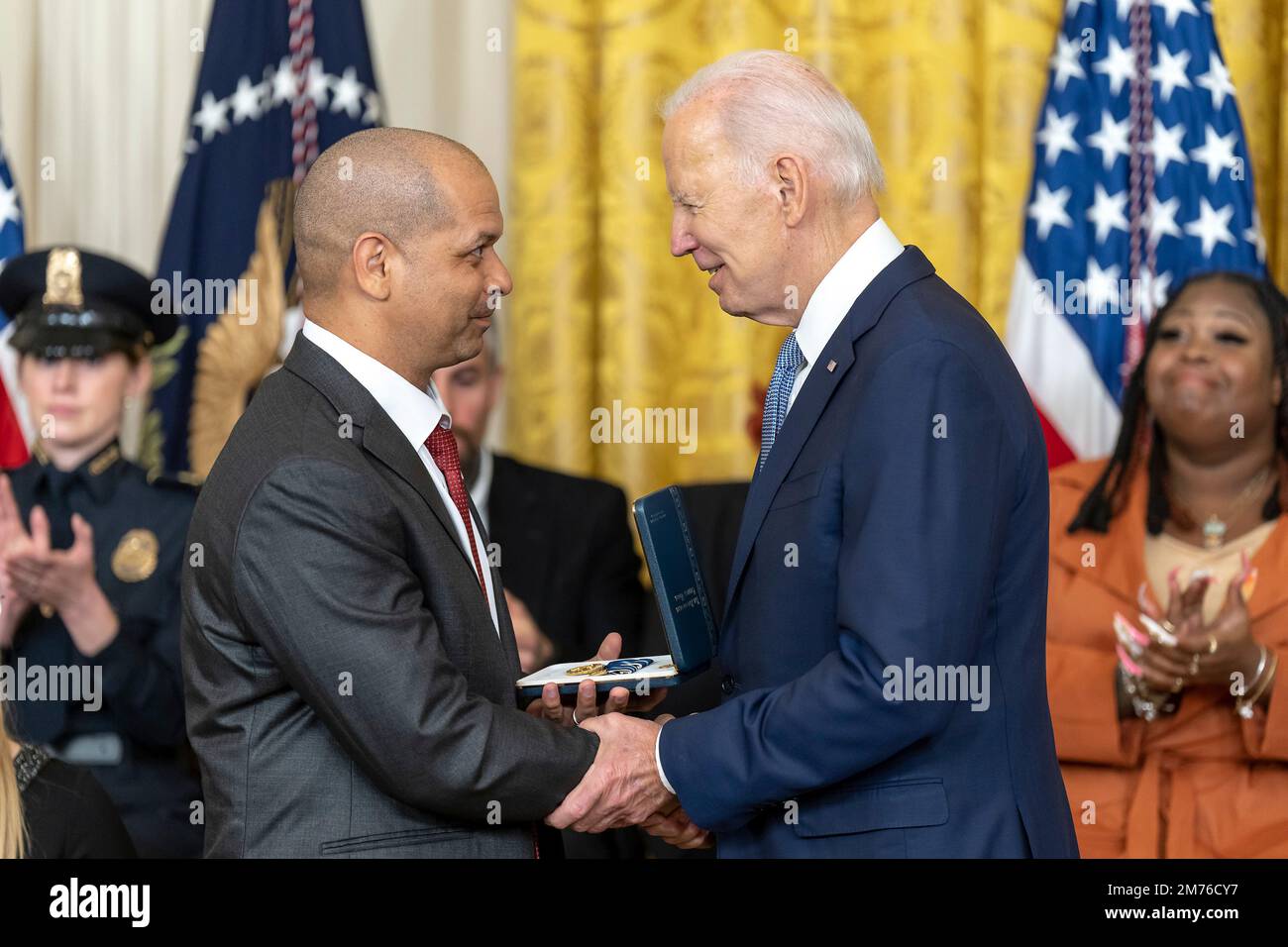 Washington, United States Of America. 06th Jan, 2023. Washington, United States of America. 06 January, 2023. U.S President Joe Biden awards the Presidential Citizens Medal to Capitol Police Sergeant Aquilino A. Gonell, left, for his role defending the Capitol during a ceremony at the East Room of the White House, January 6, 2023 in Washington, DC The ceremony marked the two-year anniversary of the January 6th insurrection. Credit: Adam Schultz/White House Photo/Alamy Live News Stock Photo