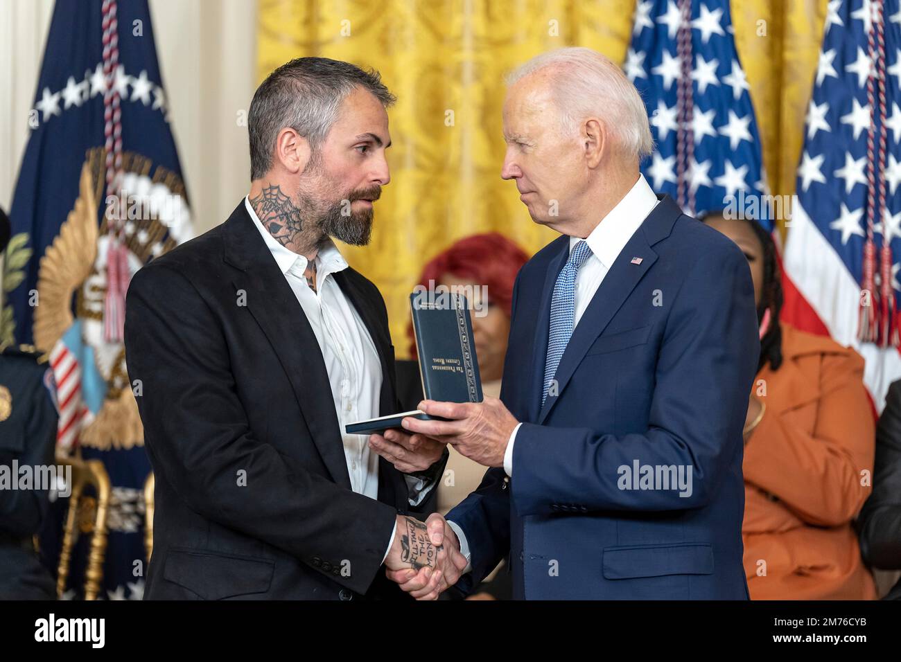 Washington, United States Of America. 06th Jan, 2023. Washington, United States of America. 06 January, 2023. U.S President Joe Biden awards the Presidential Citizens Medal to Former Metropolitan Police Department Officer Michael Fanone, left, for his role defending the Capitol during a ceremony at the East Room of the White House, January 6, 2023 in Washington, DC The ceremony marked the two-year anniversary of the January 6th insurrection. Credit: Adam Schultz/White House Photo/Alamy Live News Stock Photo