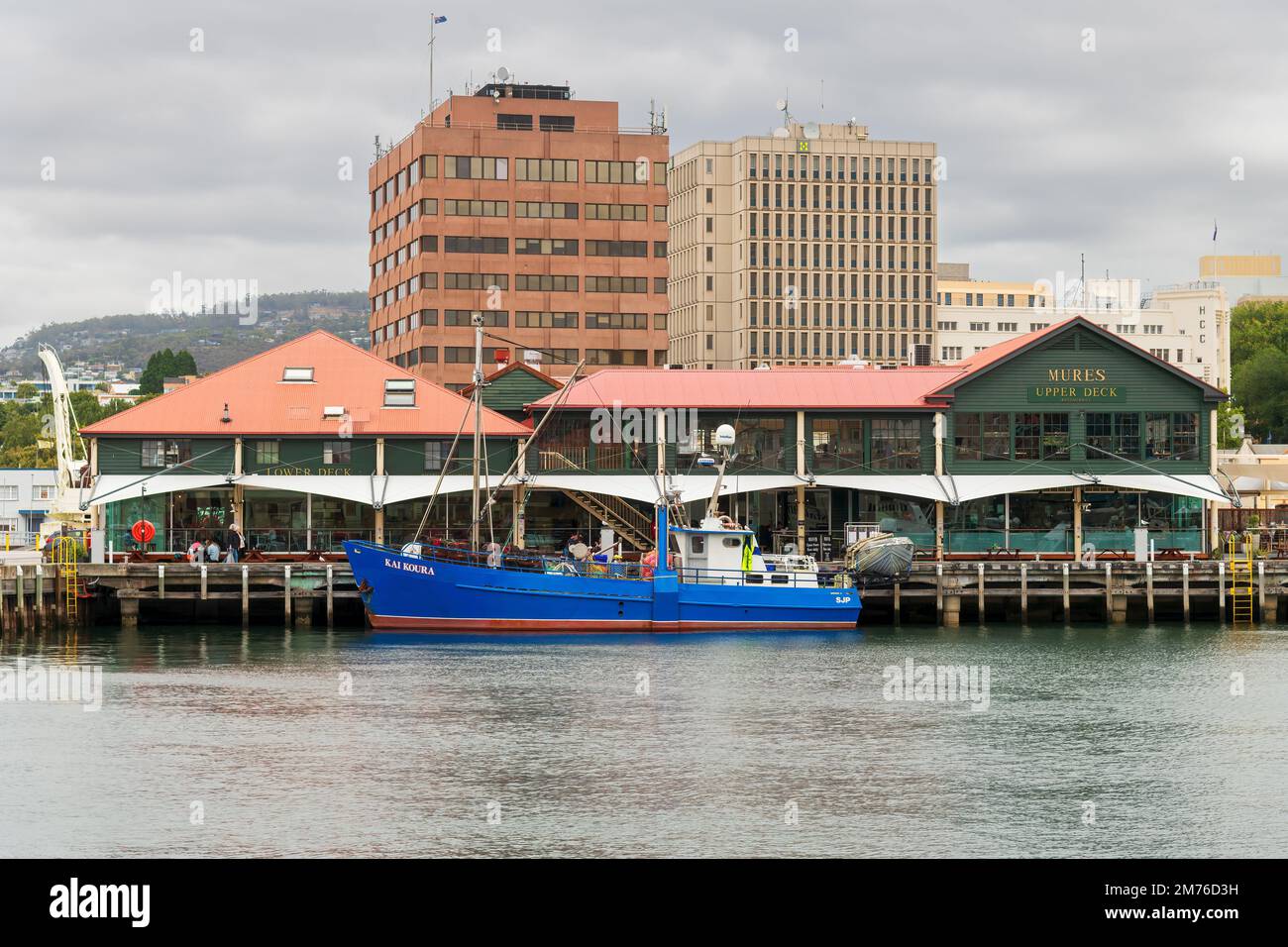 HOBART, TASMANIA, AUSTRALIA. March 06, 2022.  fishing vessel moored in the Victoria dock along side the Mures seafood restaurant. Stock Photo