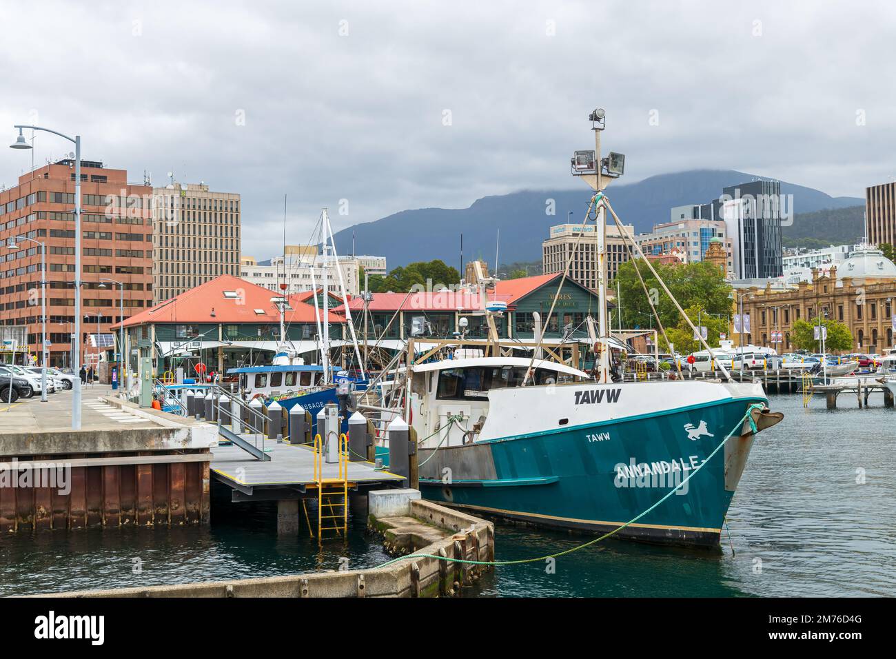 HOBART, TASMANIA, AUSTRALIA. March 06, 2022.  fishing vessel moored in the Victoria dock on an overcast day, with Mount Wellington in the distance. Stock Photo