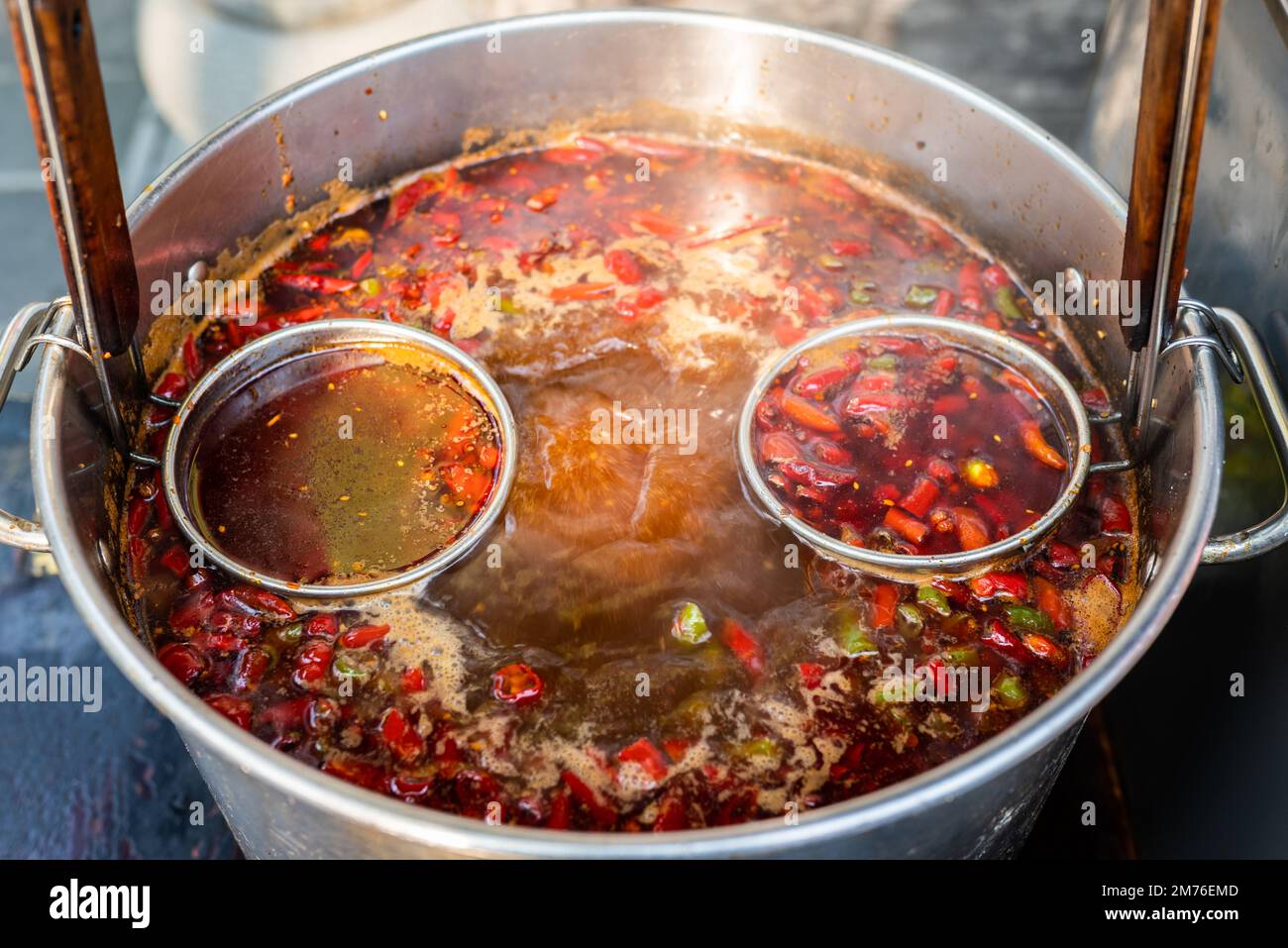 Boiling chili pepper sauce in a cooking pot Stock Photo Alamy