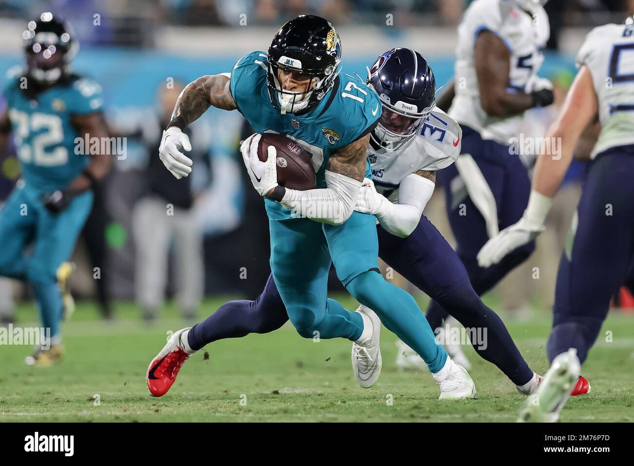 Jacksonville, Florida, USA. January 7, 2023: Jacksonville Jaguars tight end  EVAN ENGRAM (17) runs with the ball during the Jacksonville Jaguars vs  Tennessee Titans NFL game at TIAA Bank Field Stadium in