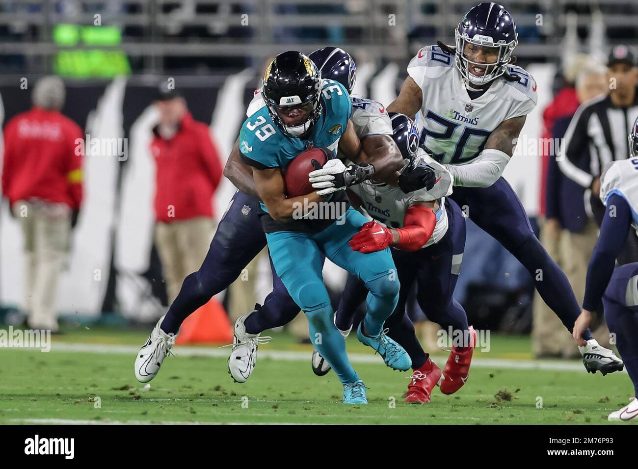 Jacksonville, Florida, USA. January 7, 2023: Jacksonville Jaguars wide  receiver JAMAL AGNEW (39) gets tackled after returning the ball during the  Jacksonville Jaguars vs Tennessee Titans NFL game at TIAA Bank Field