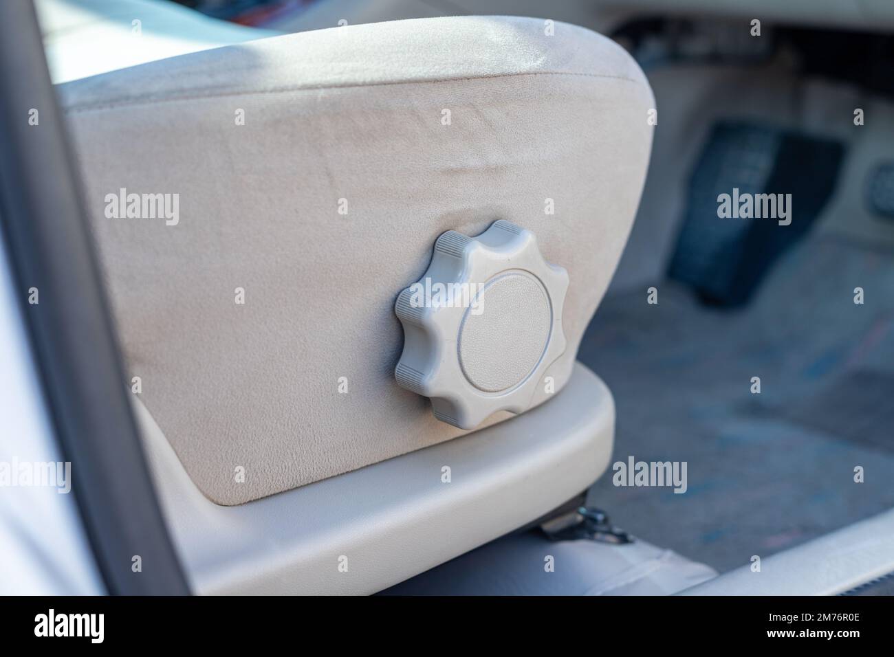Car seat sitting position adjustment knob Stock Photo Alamy