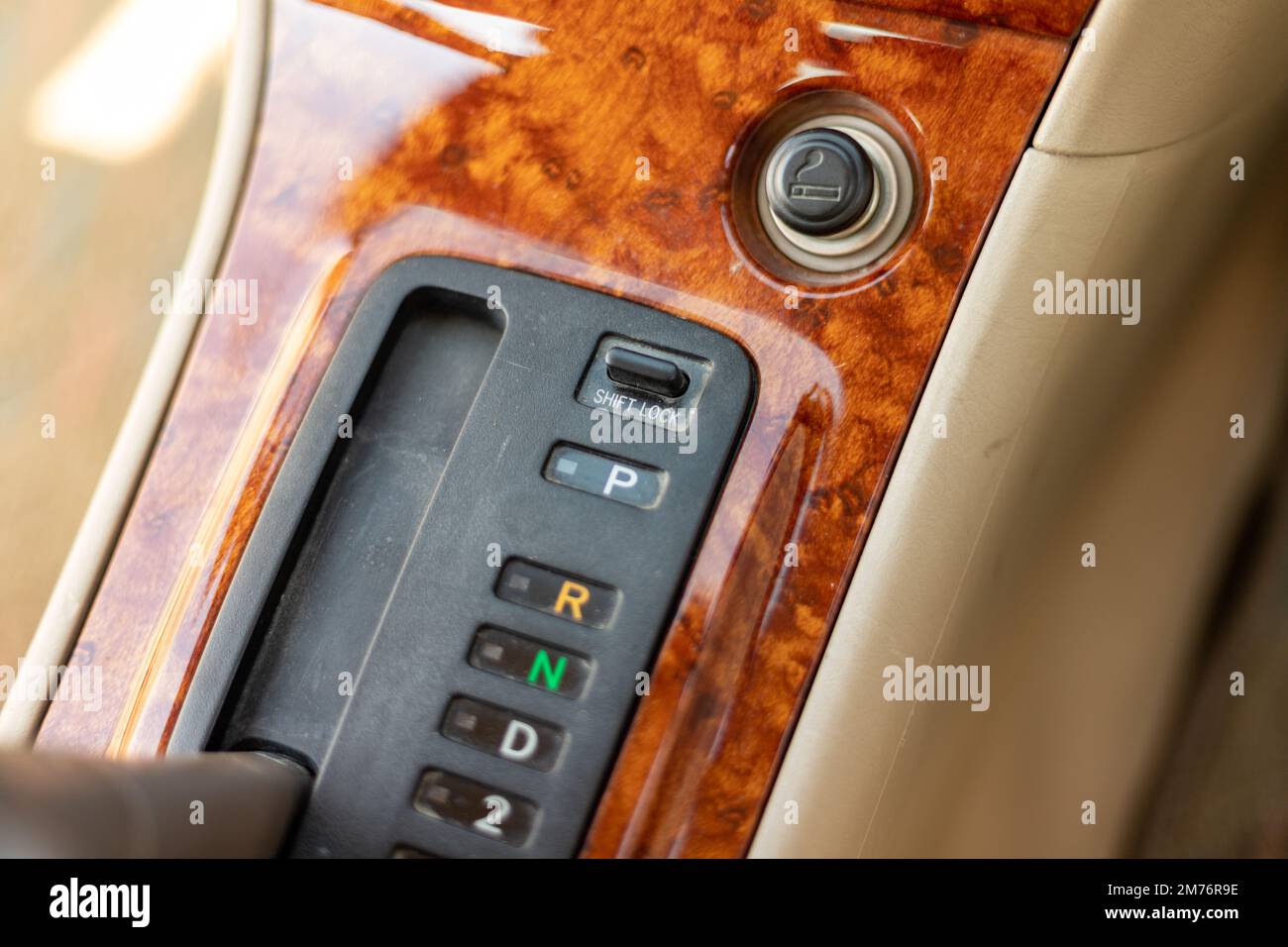 Shift lock button closeup of an automatic transmission vehicle for changing the gear Stock Photo