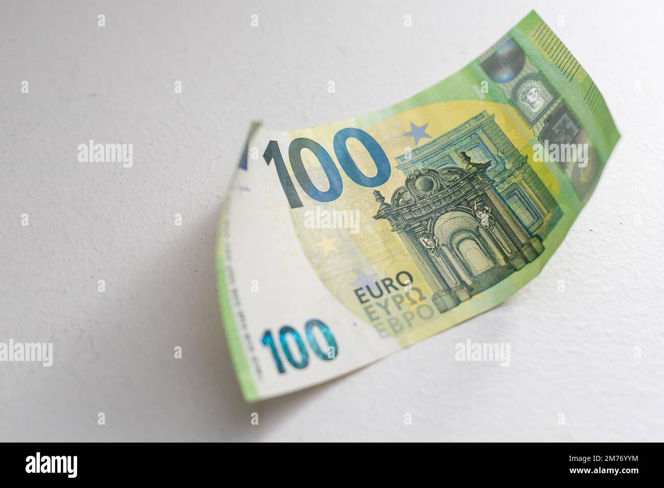 Banknote in one hundred euro isolated on a white background Stock Photo ...
