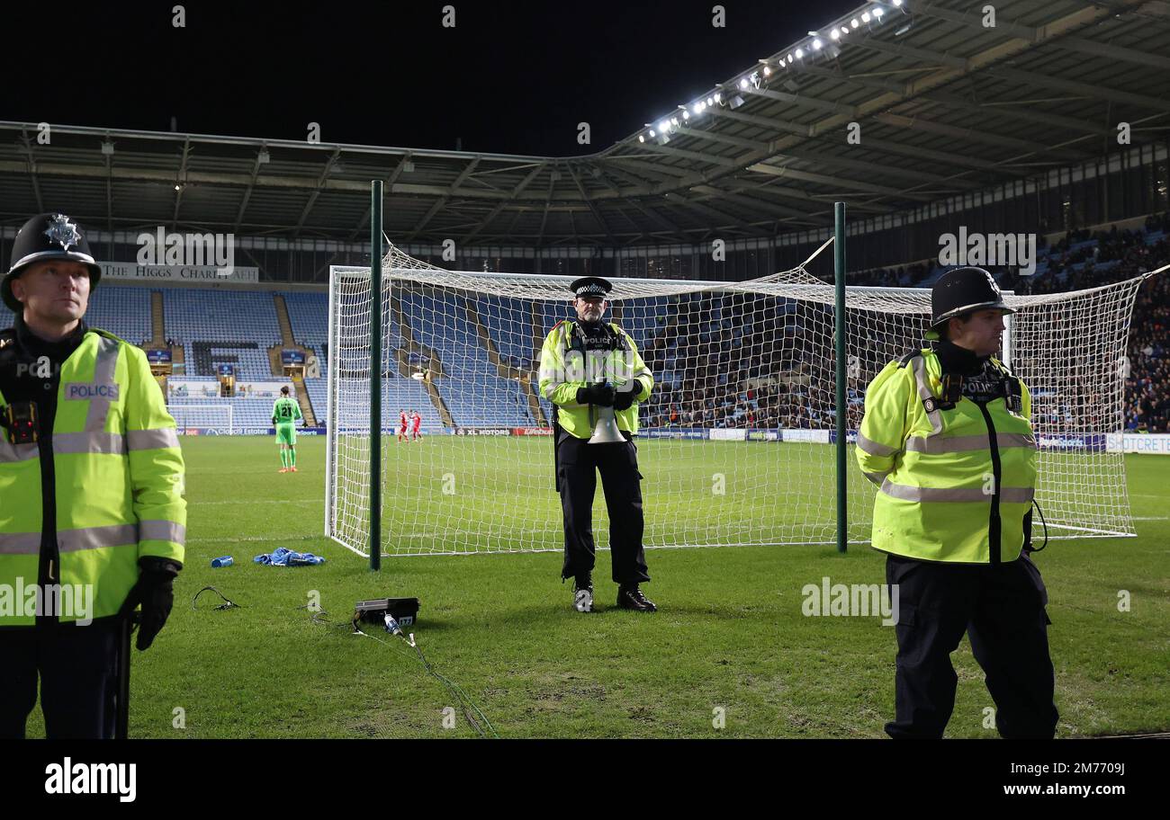 Coventry, UK. 7th Jan, 2023. Police officers stand on the pitch during the The FA Cup match at the Coventry Building Society Arena, Coventry. Picture credit should read: Darren Staples/Sportimage Credit: Sportimage/Alamy Live News Stock Photo