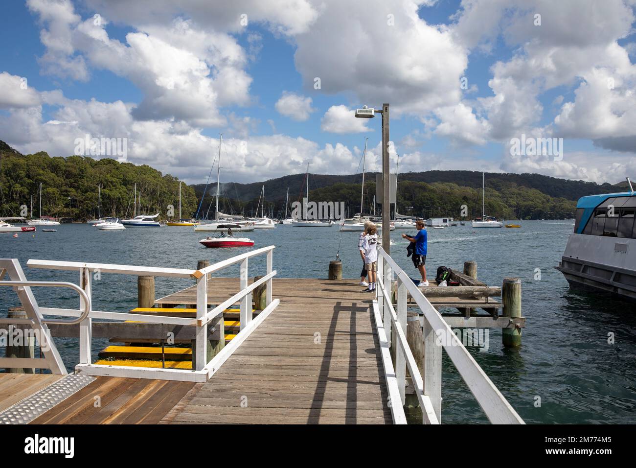 Church Point precinct ferry commuter wharf, boys fishing from the jetty