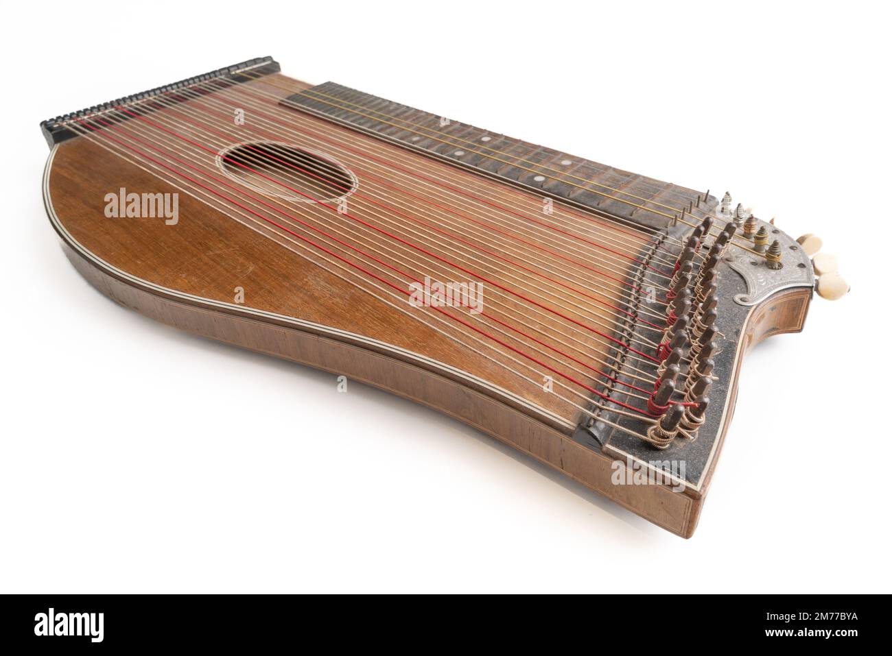 High angle closeup horizontal studio shot of vintage, old wooden zither