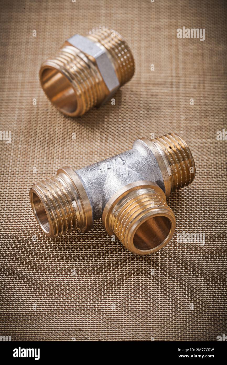 Plumbing fixtures connector fittings on water mesh filter. Stock Photo