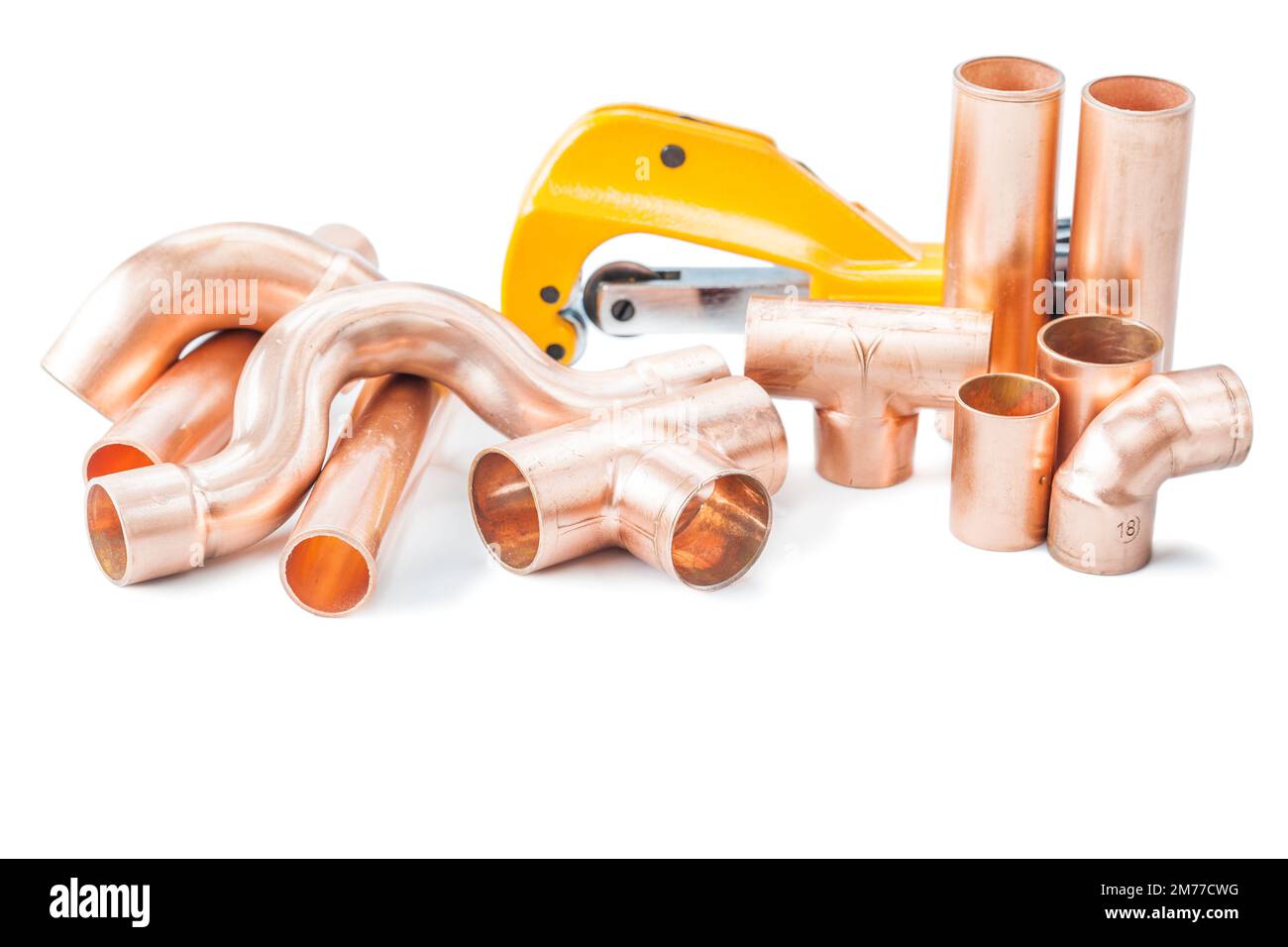 plumbing tools copper pipes fittings and pipe cutter isolated Stock Photo