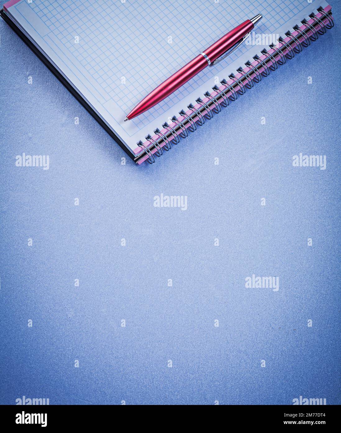 Red pen blank checked workbook office concept Stock Photo Alamy