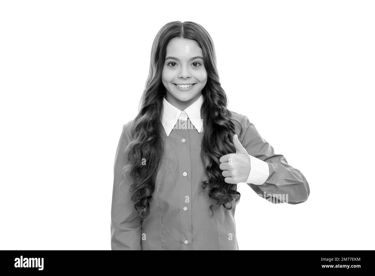 happy face of teen girl with long curly hair isolated on white show thumb up, hair Stock Photo