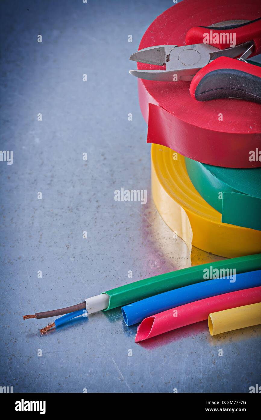 Set of insulating tapes nippers electric wires construction concept