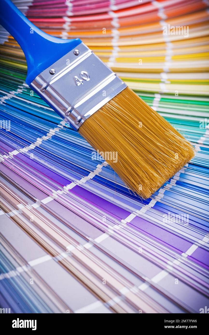 single paint brush on color palette Stock Photo Alamy
