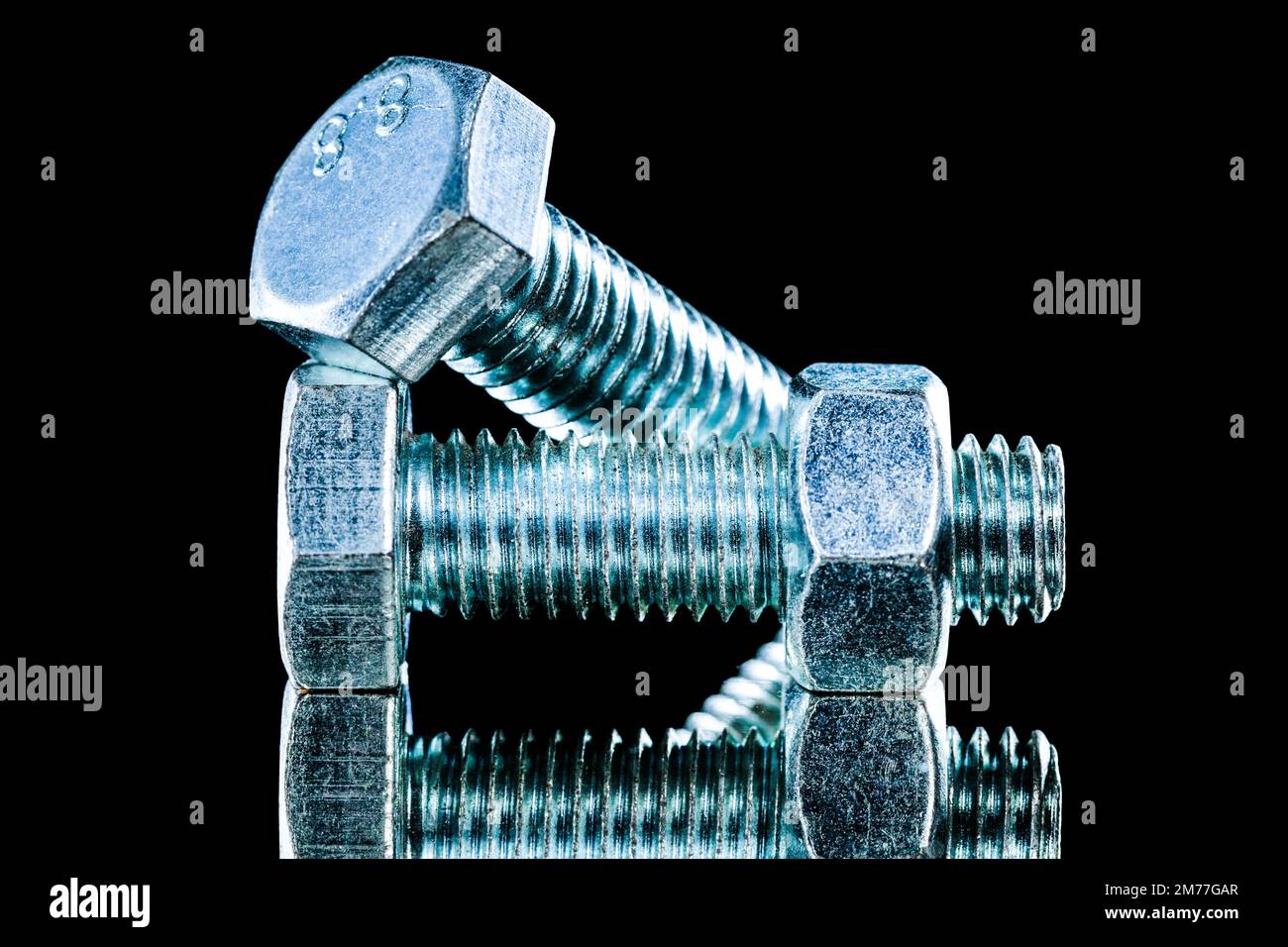 Stainless nut bolt details on black background Stock Photo Alamy