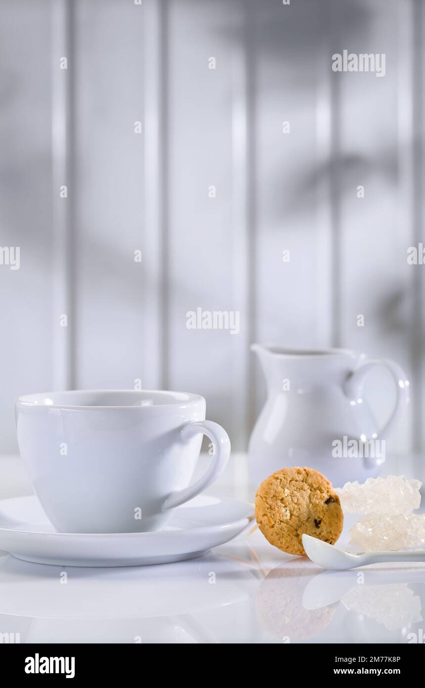 white coffee items on table Stock Photo