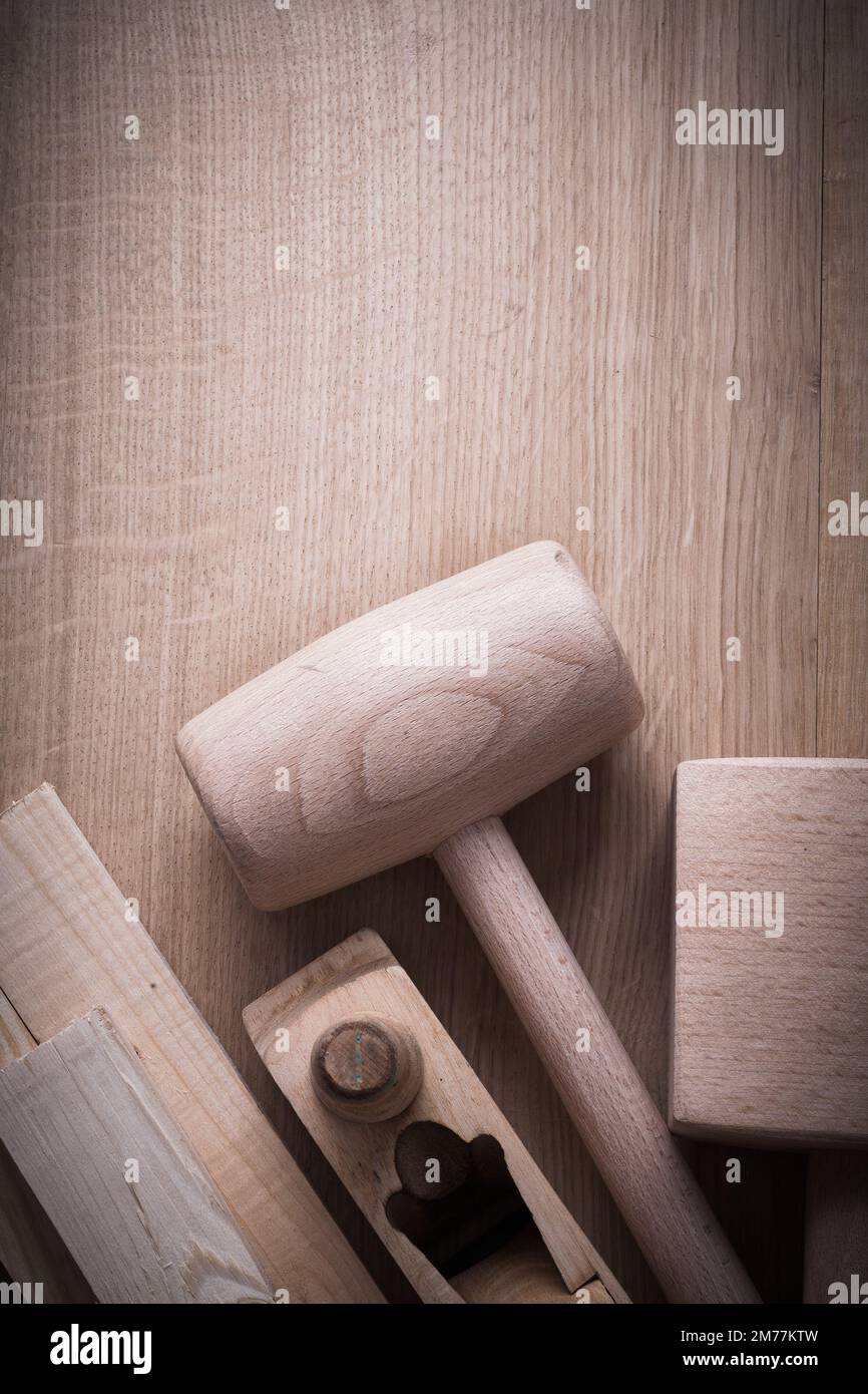 Wooden planks hammers planner on wood background copy space image construction concept. Stock Photo