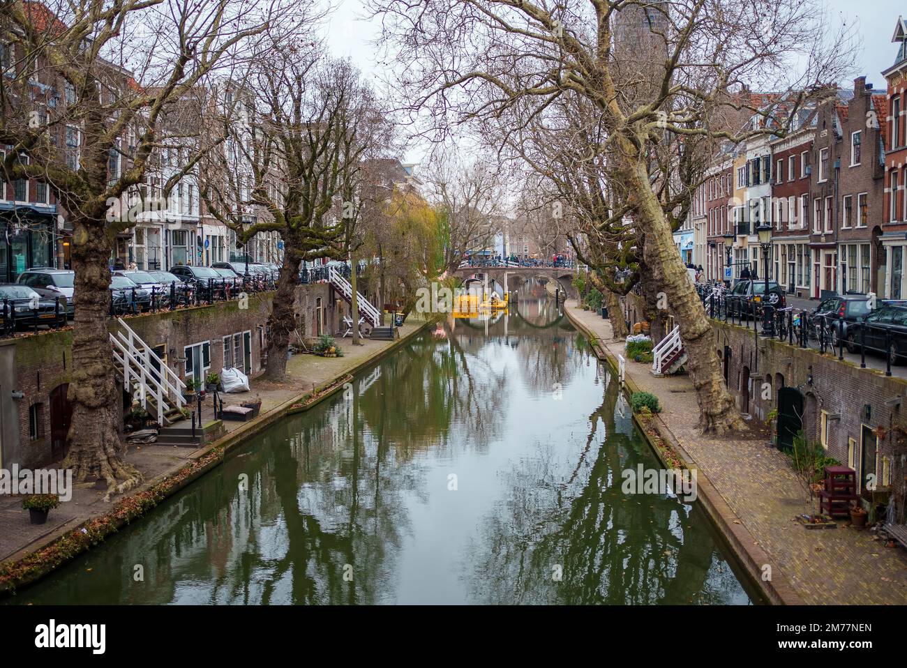 Ancient city center of Utrecht, Netherland - canal view with cafes, restaurants and shops in winter or autumn time Stock Photo