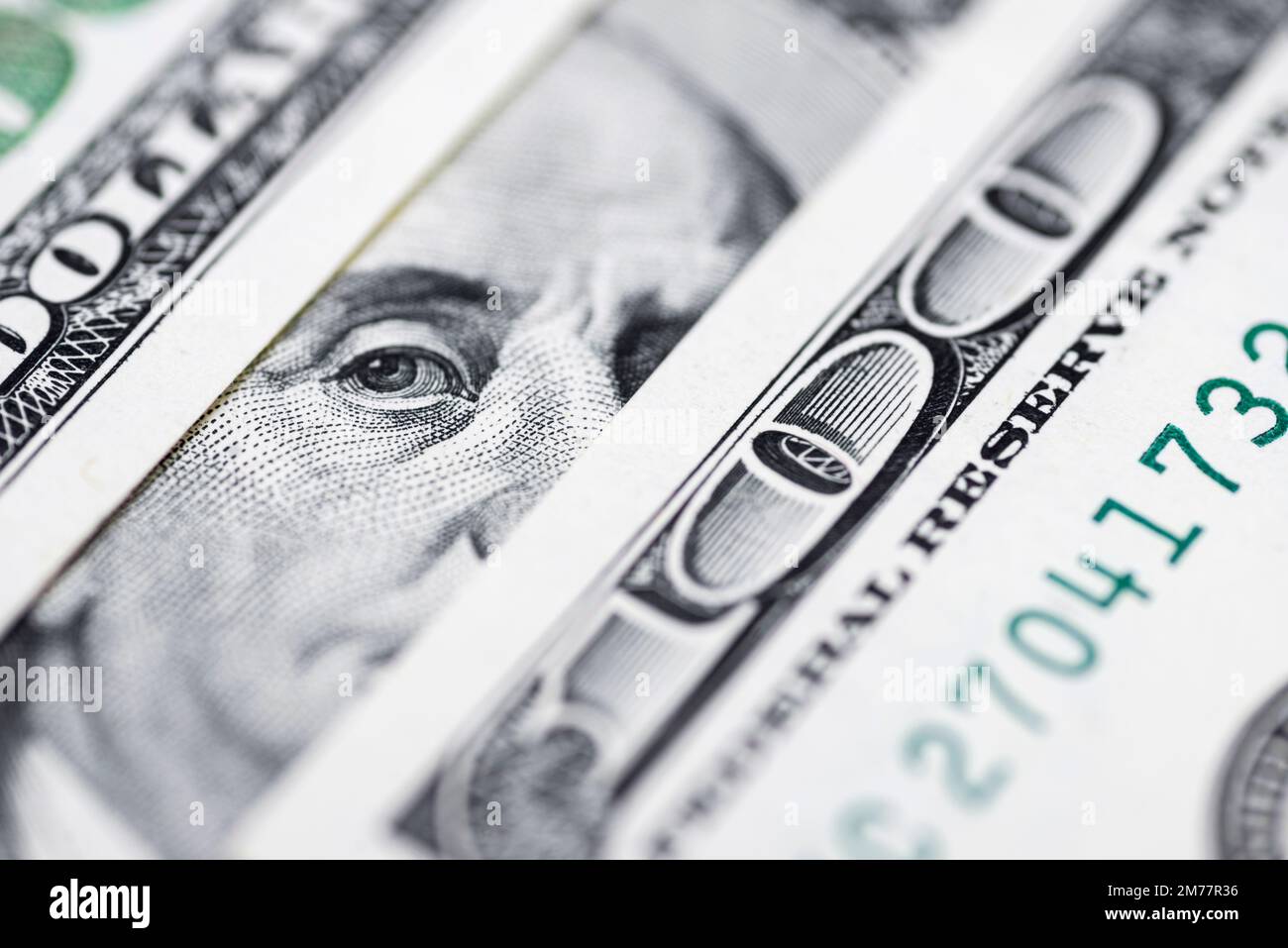 Benjamin Franklin's eyes from a hundred-dollar bill. 100 dollar bill ...