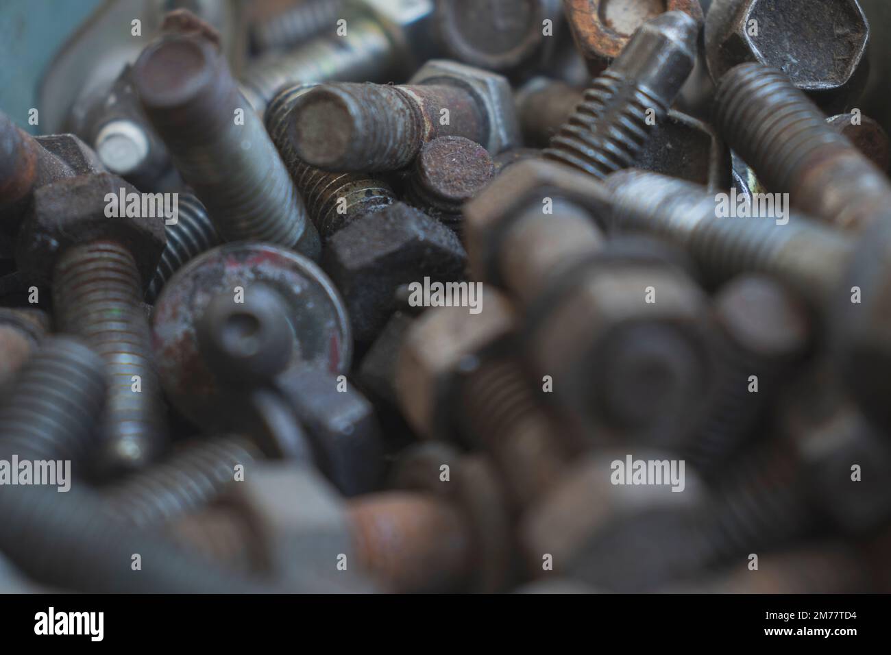 Close-up of rusty and new bolts, Concept of car mechanic tools, industrial. Copy space. Stock Photo