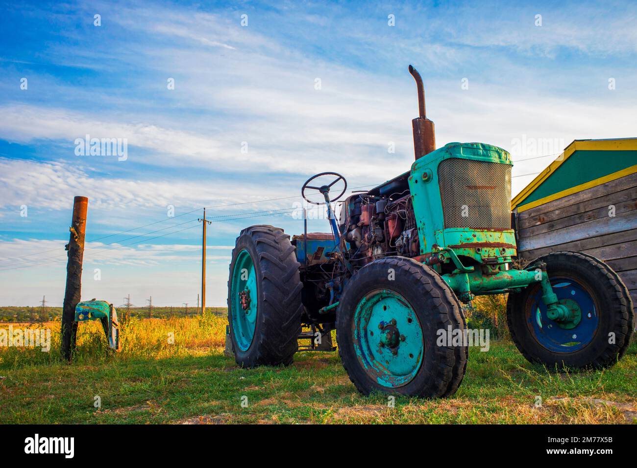 old tractor in field Stock Photo - Alamy