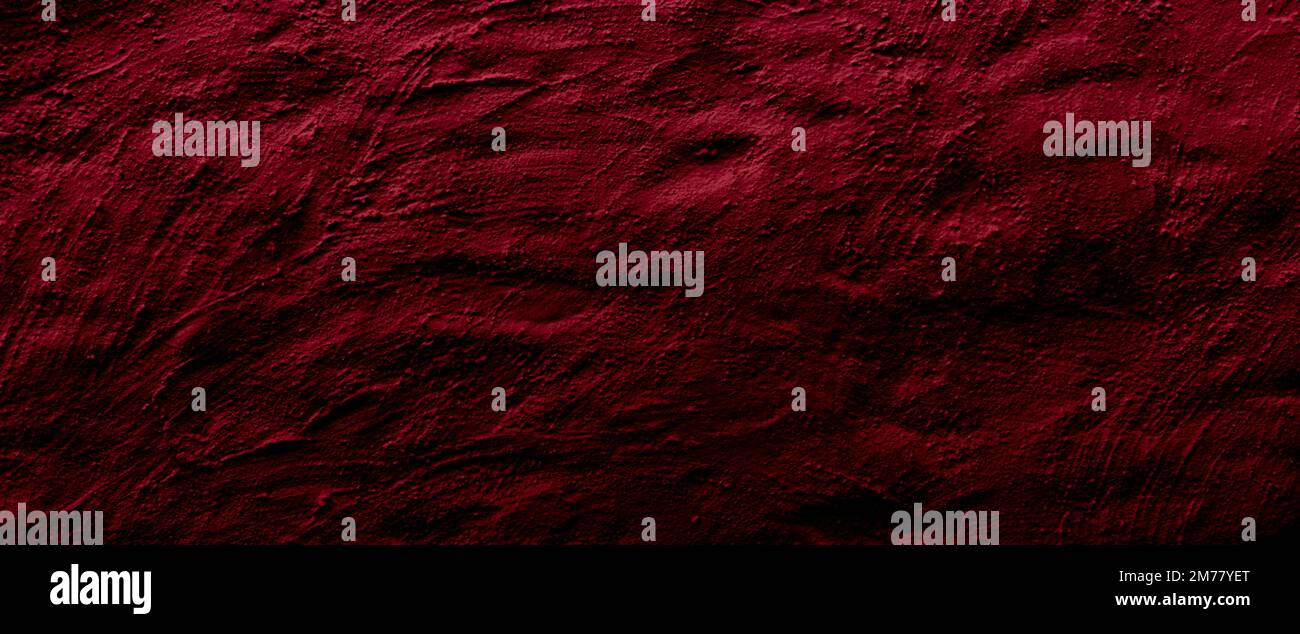 crimson red colored abstract wall background with textures of different shades of red Stock Photo