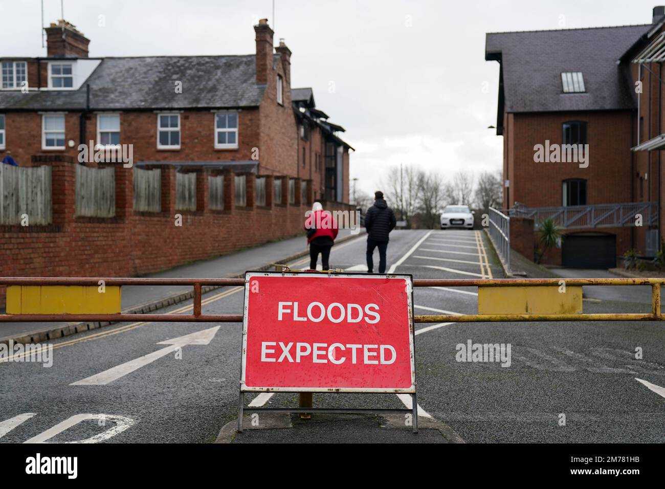 A sign warning people of upcoming flooding block the entrance to Frankwell car park in Shrewsbury, which has been closed due to it's proximity to the river Severn. The Environment Agency (EA) has two flood warnings in place in the town. Picture date: Sunday January 8, 2023. Stock Photo