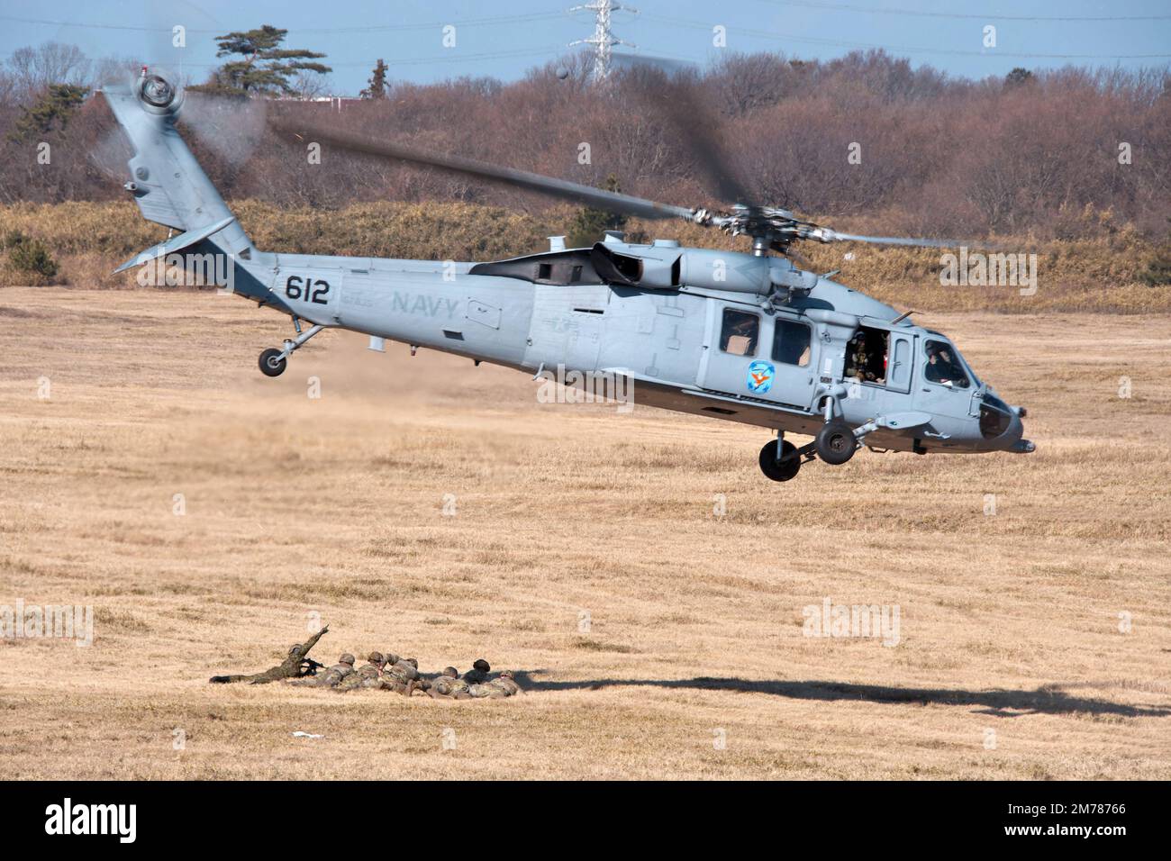 Narashino, Japan. 08th Jan, 2023. Soldiers of U.S. Army land on the drop zone from U.S. Navy's MH-60 during New year drill by the Japan's GSDF 1st Airborne Brigade at Narashino Training Area in Chiba-Prefecture, Japan on Sunday, January 8, 2023. Photo by Keizo Mori/UPI Credit: UPI/Alamy Live News Stock Photo