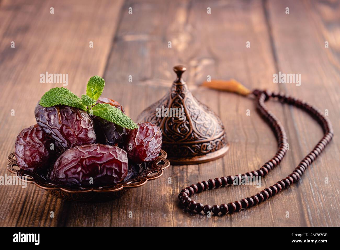 Dried dates fruit and rosary. Popular fruit of Ramadan Stock Photo Alamy