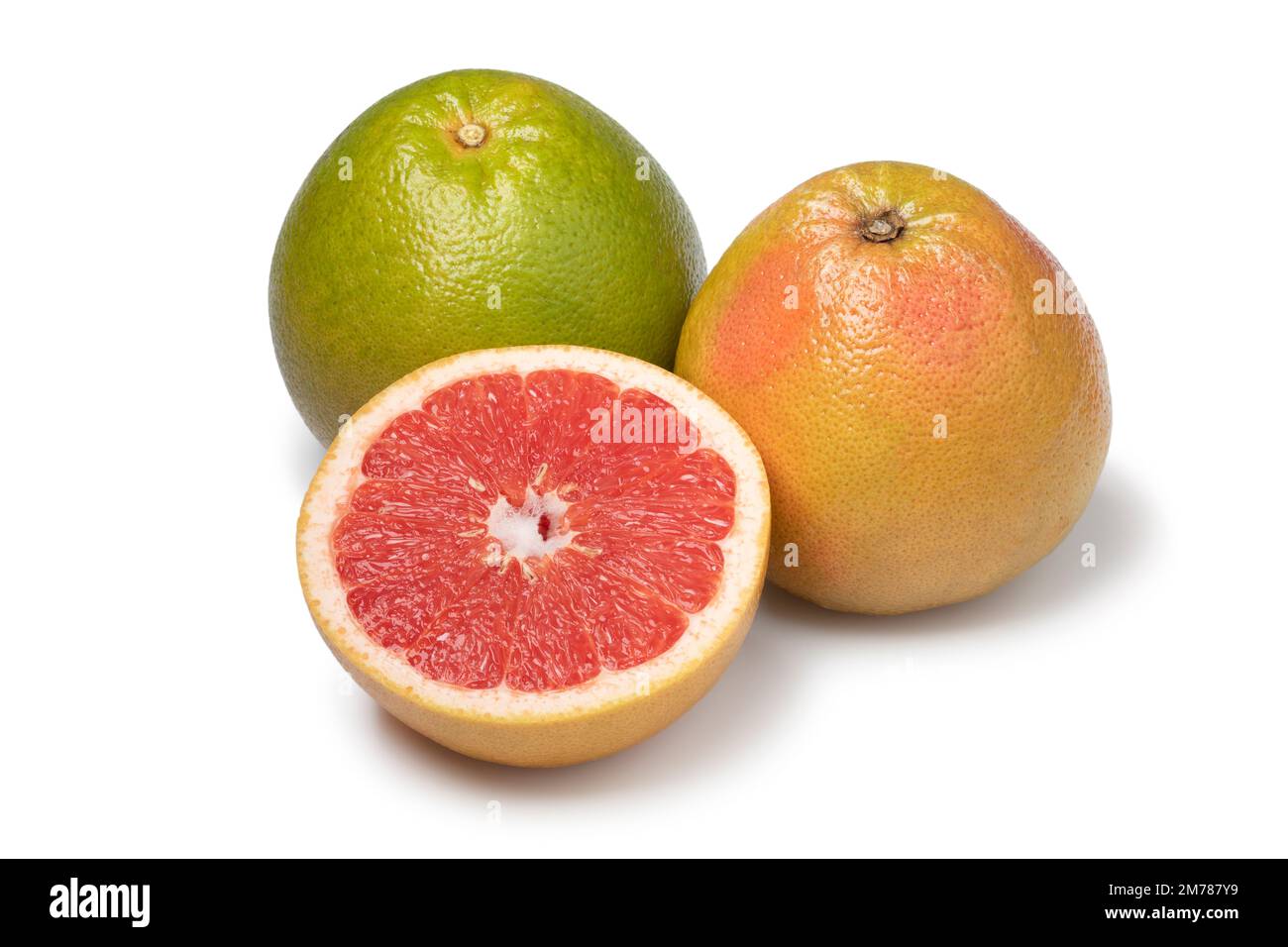 Whole and halved red juicy grapefruit close up isolated on white background Stock Photo