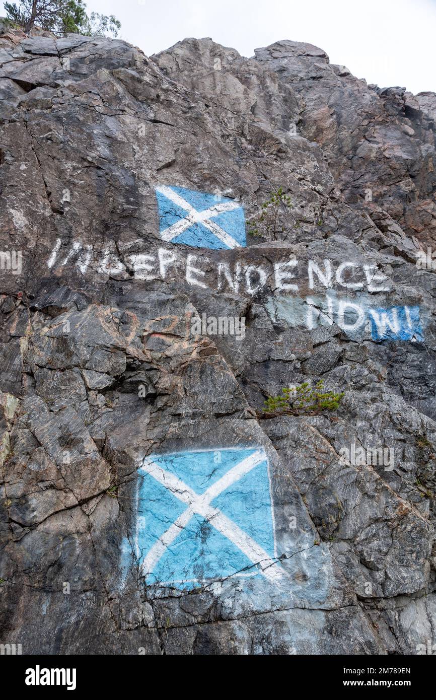 Scottish Independence protest painted onto a rock face alongside the A9 in the Highlands of Scotland, UK. Stock Photo