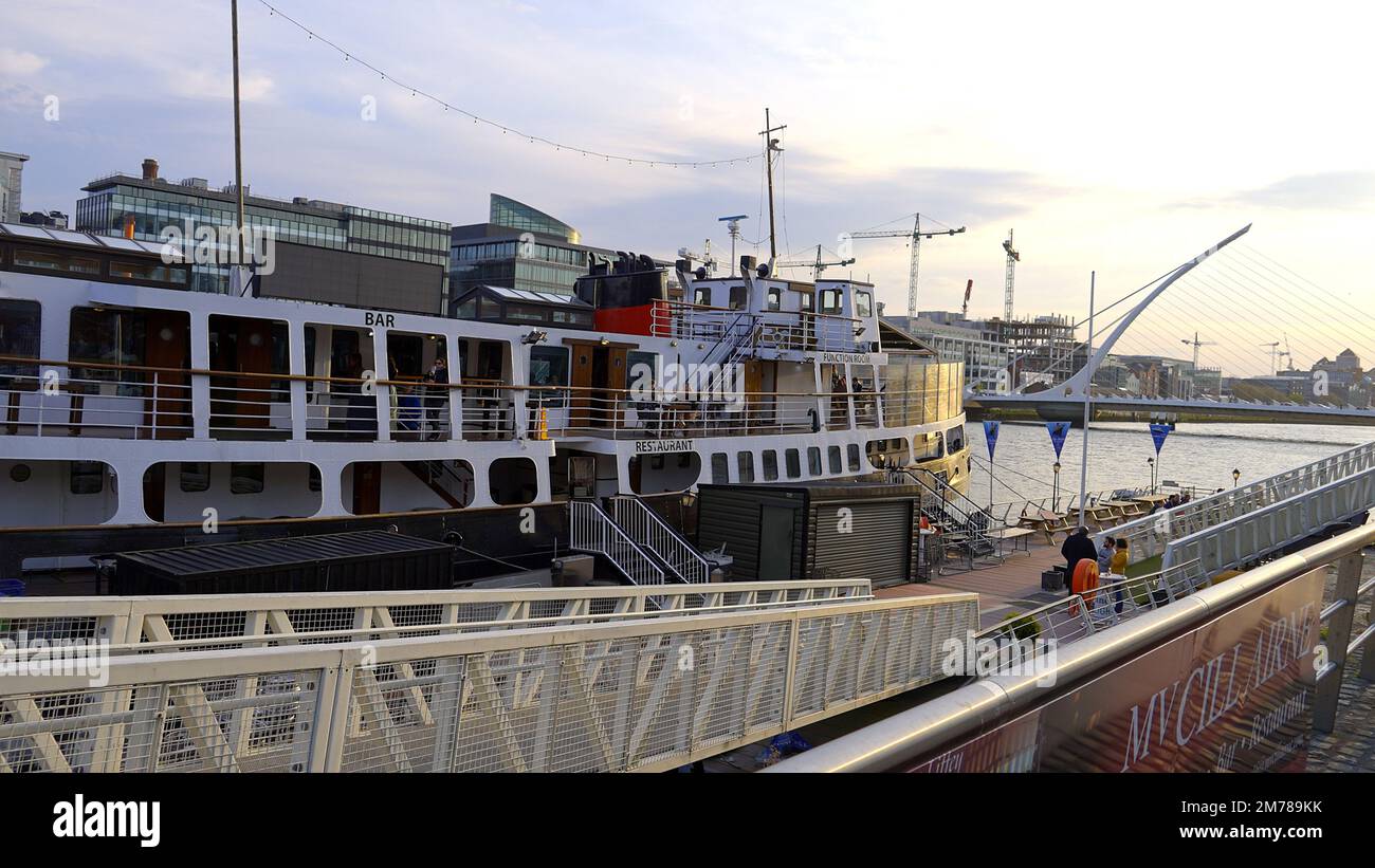Party and Restaurant Boat on River Liffey in Dublin - DUBLIN, IRELAND - APRIL 20, 2022 Stock Photo