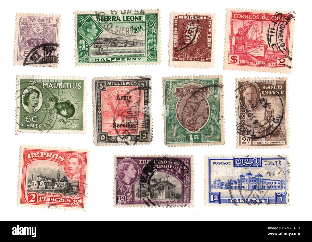Vintage used postage stamps from around the world isolated on a white