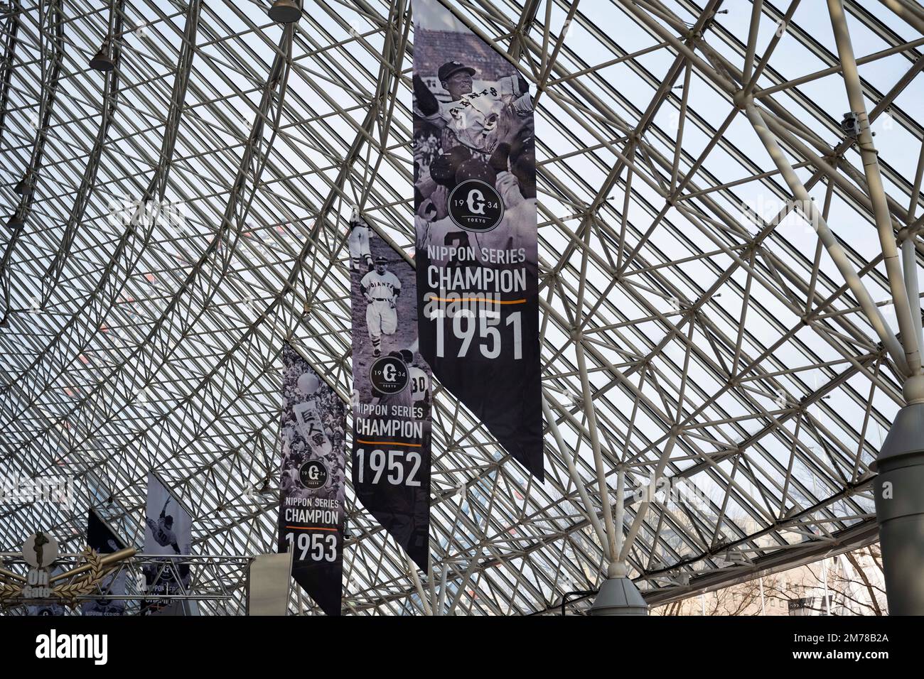 Tokyo, Japan. 6th Jan, 2023. Banners of Nippon Championships won by the Yomiuri Giants at the Tokyo Dome on an off-season day.The Tokyo Dome is a multi-purpose stadium dome roofed indoor stadium. It was completed in 1988 and has a capacity of 55,000 people. The dome has a retractable roof, making it suitable for hosting both indoor and outdoor events. It is the home of the Yomiuri Giants, a professional baseball team in the Nippon Professional Baseball, and is also used for concerts, exhibitions, and other sporting events. It is a popular tourist attraction and offers a variety of ameniti Stock Photo