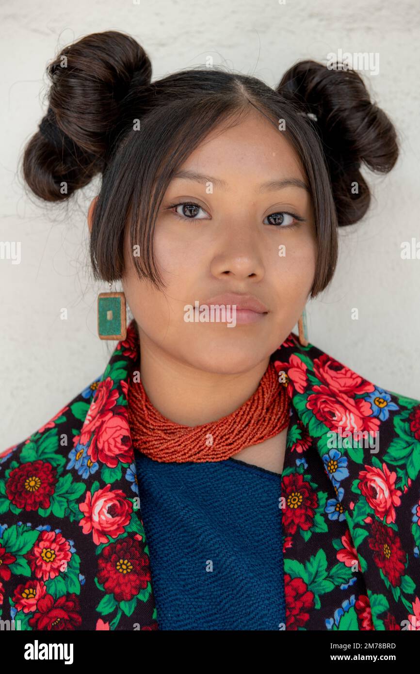 Faces of the World: Young Hopi Woman with traditional Squash Blossom Whorl Stock Photo