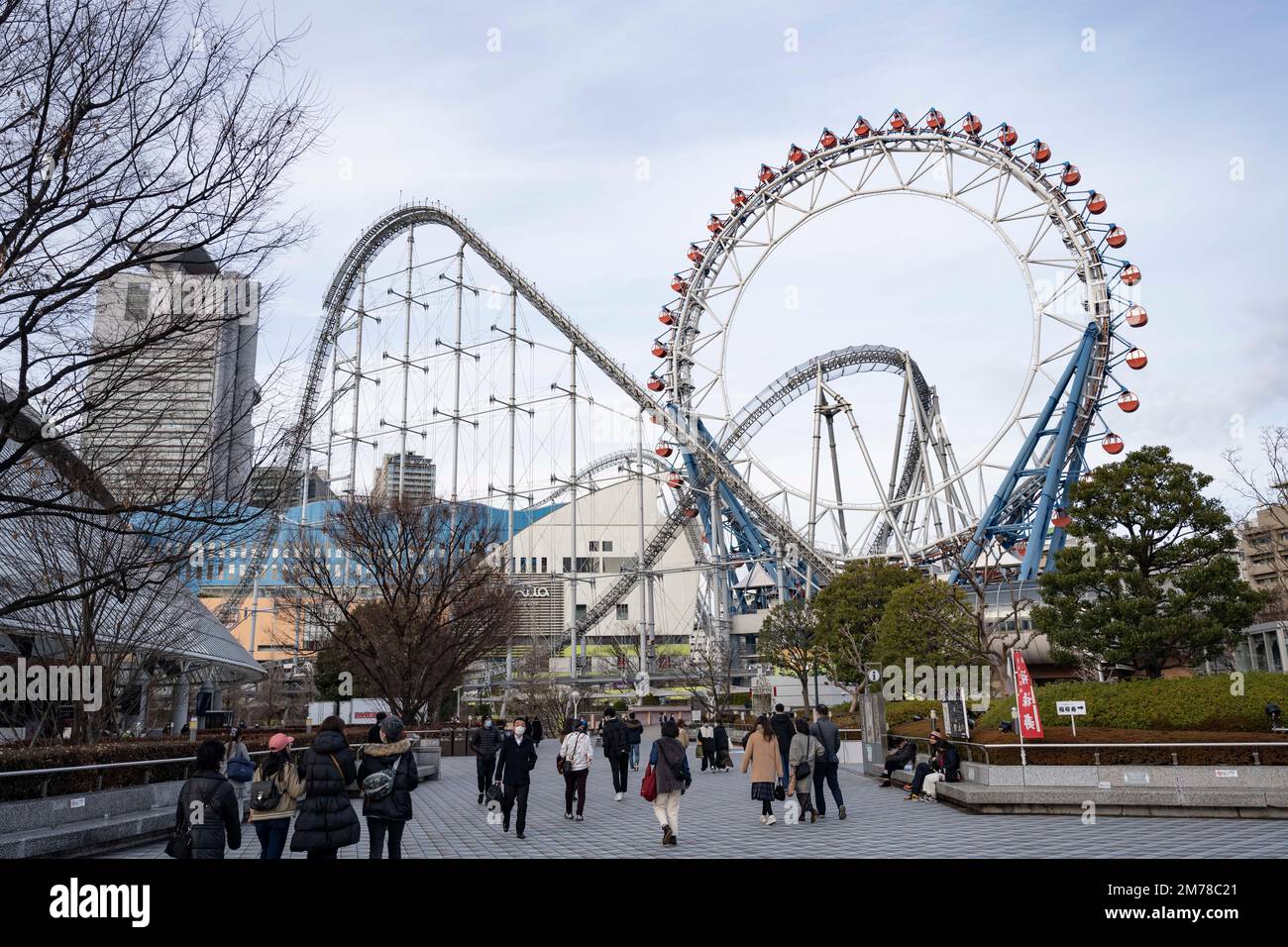 Tokyo, Japan. 6th Jan, 2023. Rollercoasters at the Tokyo Dome City amusement park.The Tokyo Dome is a multi-purpose stadium dome roofed indoor stadium. It was completed in 1988 and has a capacity of 55,000 people. The dome has a retractable roof, making it suitable for hosting both indoor and outdoor events. It is the home of the Yomiuri Giants, a professional baseball team in the Nippon Professional Baseball, and is also used for concerts, exhibitions, and other sporting events. It is a popular tourist attraction and offers a variety of amenities in Tokyo Dome City, including restaurants Stock Photo