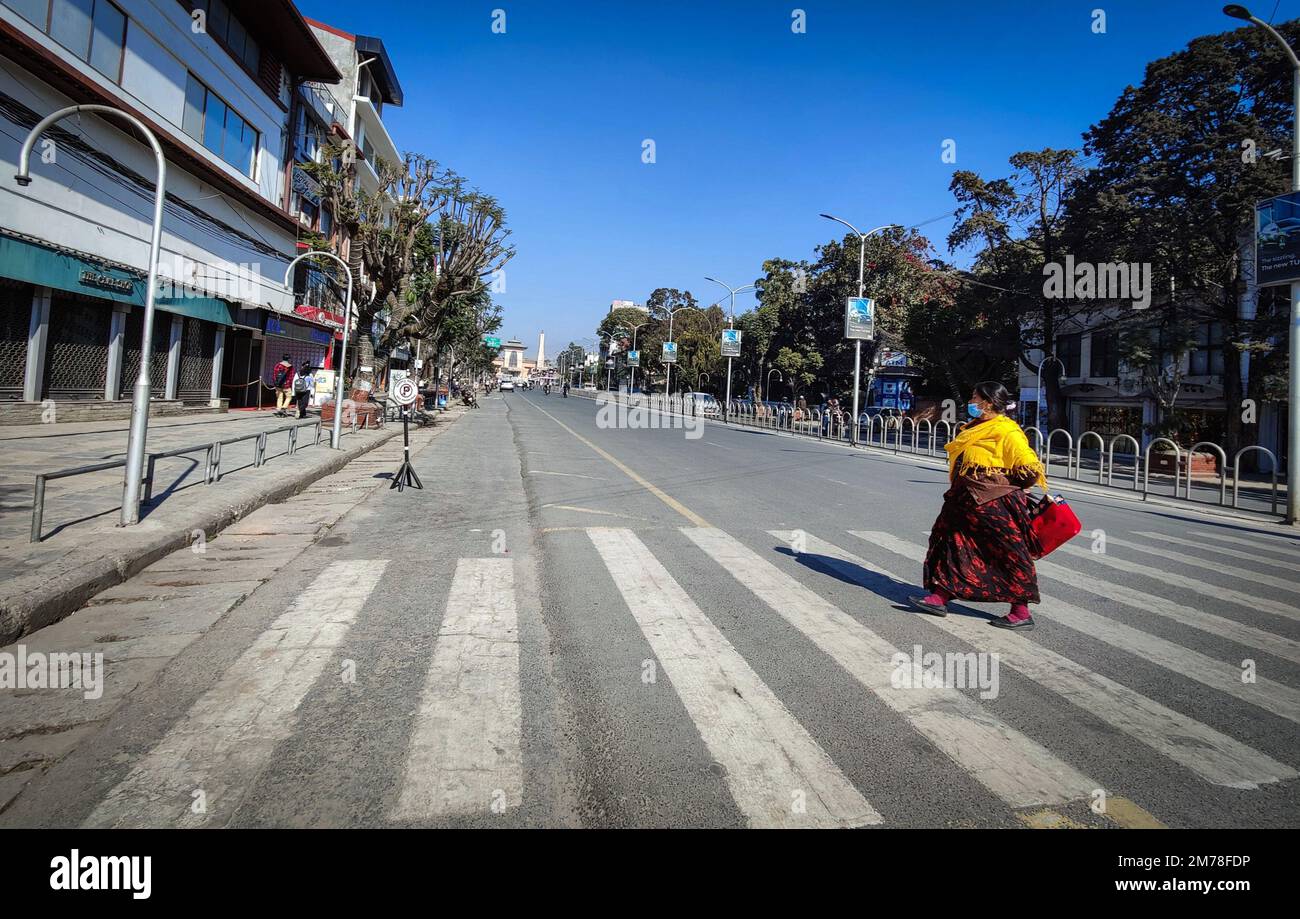 Kathmandu, Bagmati, Nepal. 8th Jan, 2023. A woman walks in King's way, locally Durbar Marg a popular tourism and shopping hub in Kathmandu, Nepal on January 8, 2023. (Credit Image: © Sunil Sharma/ZUMA Press Wire) Stock Photo