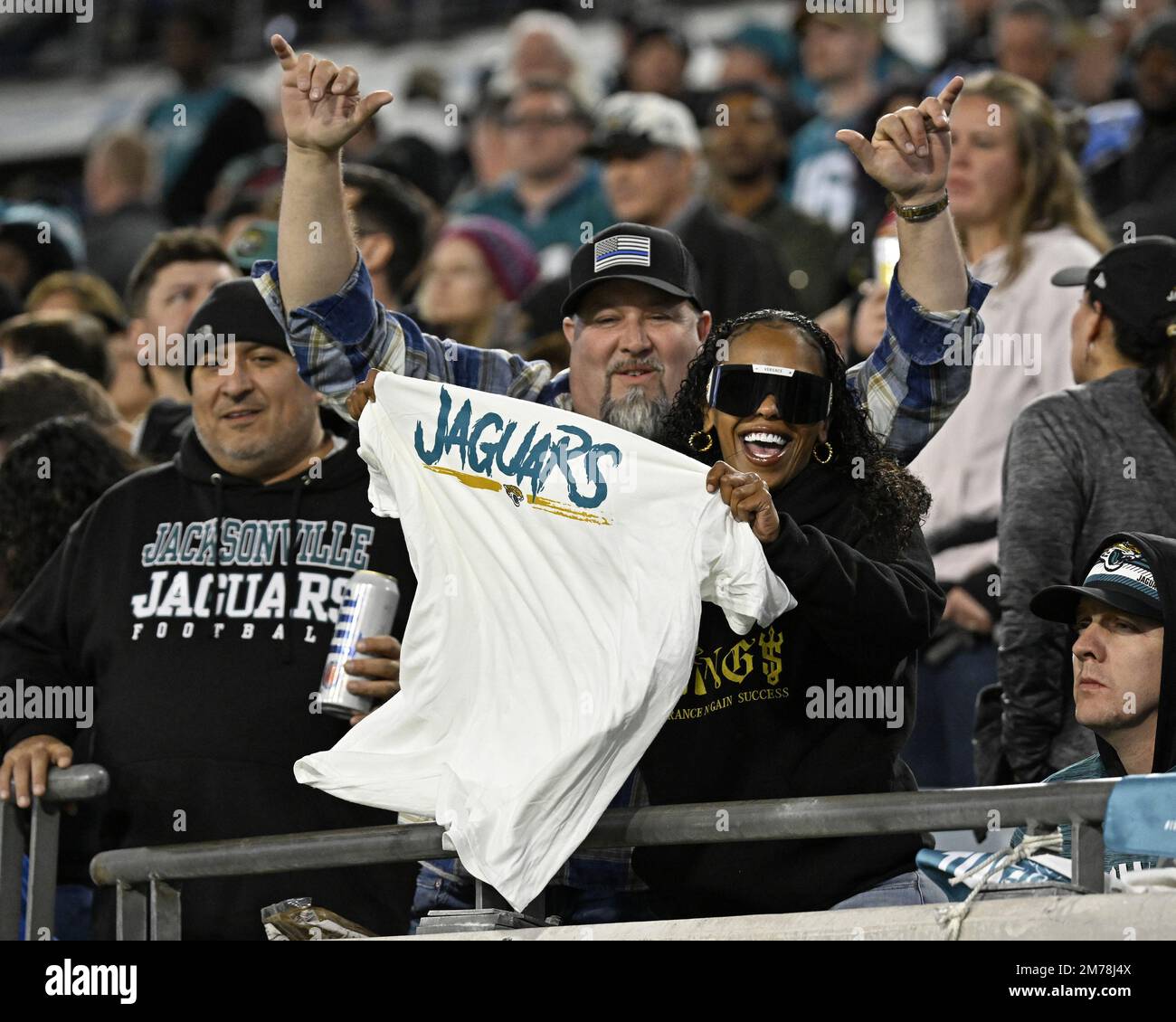 Jacksonville, United States. 07th Jan, 2023. Jaguars fans celebrate as the Titans compete against the Jaguars for the final game of the NFL 2022/23 season at the TIAA Bank Field in Jacksonville, Florida on Saturday, January 7, 2023. The Jaguars defeated the Titans 20-16 moving them into first place of the NFL Southern Conference. Photo by Joe Marino/UPI. Credit: UPI/Alamy Live News Stock Photo
