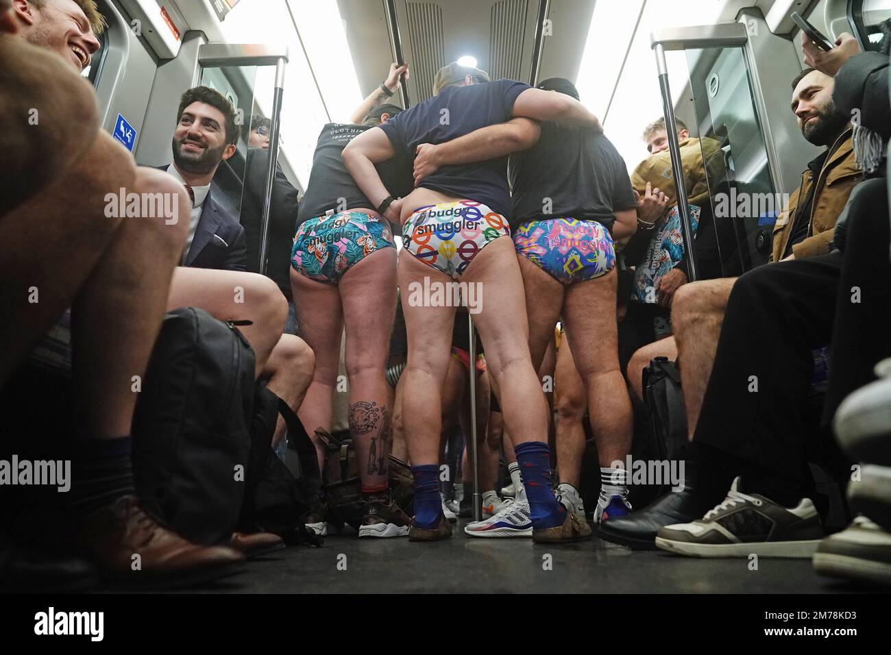 People riding the tube as they take part in the 12th annual No Trousers Tube  Ride in London. Picture date: Sunday January 8, 2023 Stock Photo - Alamy